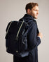MATEW-Bags-The ultimate backpack for your on-the-go lifestyle, MATEW combines functionality with a bold, fashionable design. Featuring webbing details and side release buckles, this backpack is made to last. The top handle and adjustable shoulder straps make it easy to carry and the elasticated side pocket adds an extra level of convenience. A silicone logo patch finishes the look. The shell fabric of this product is made of 100% recycled polyester. Using recycled polyester helps divert plastic waste from e